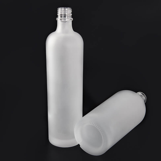 Заморозить заморозку круглую спиртные стеклянные бутылки