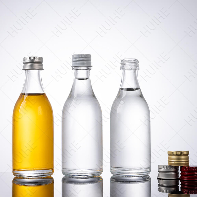 Круглые прозрачные стеклянные бутылочки из бесцветного стекла объемом 50 мл для алкоголя